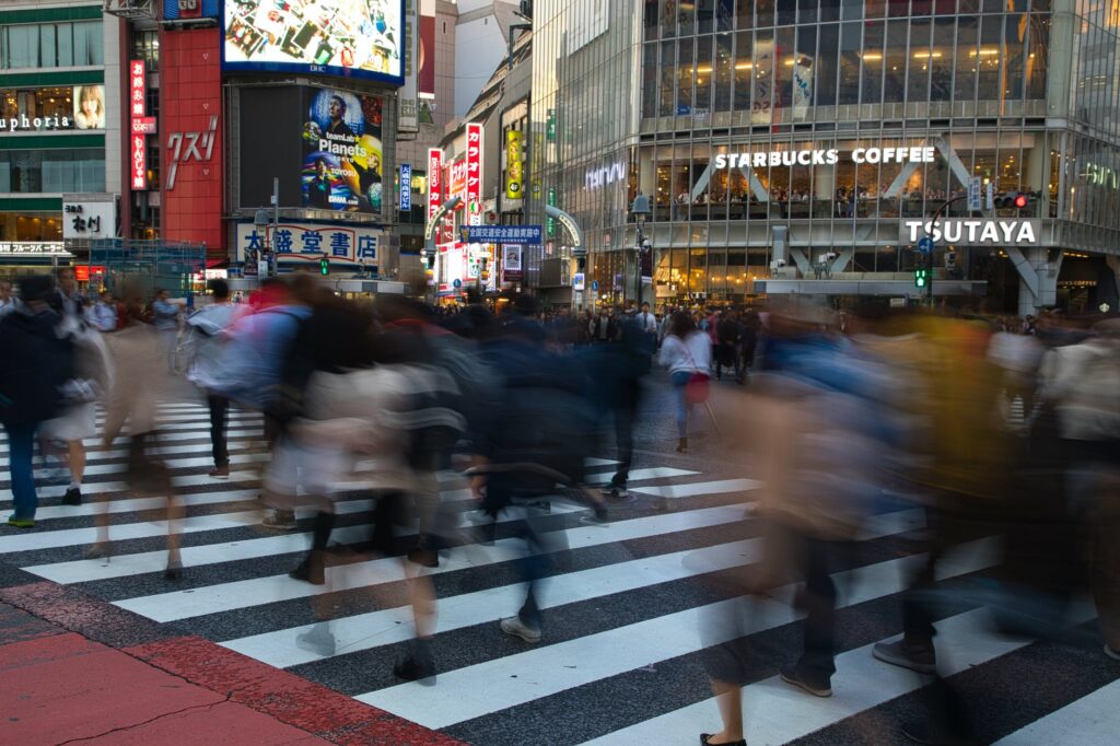 city crossing road traffic