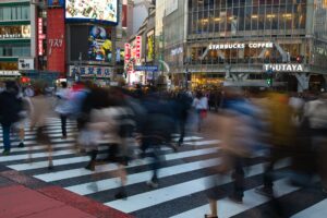 city crossing road traffic